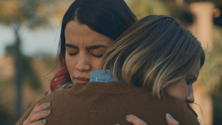 Vanessa and Jennifer hugging in I'm Totally Fine