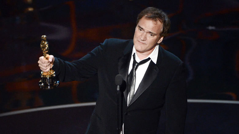 Quentin Tarantino holding Oscar