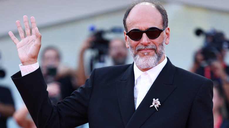 Luca Guadagnino waving