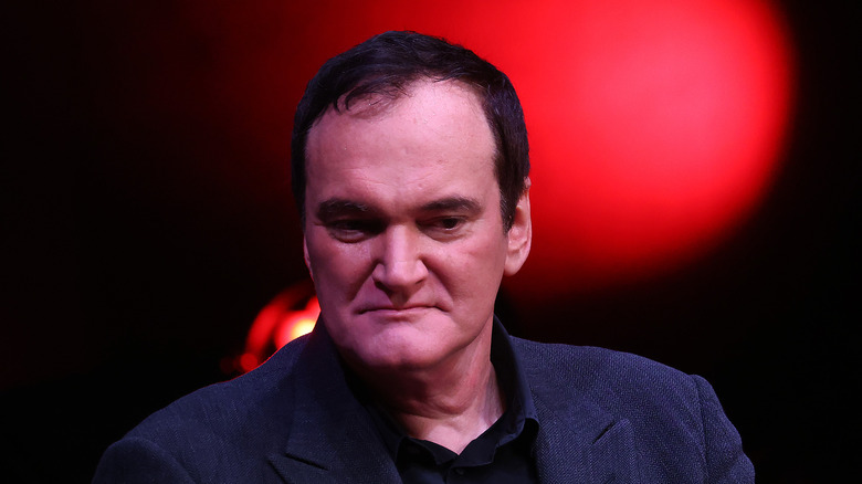 Quentin Tarantino wearing a suit