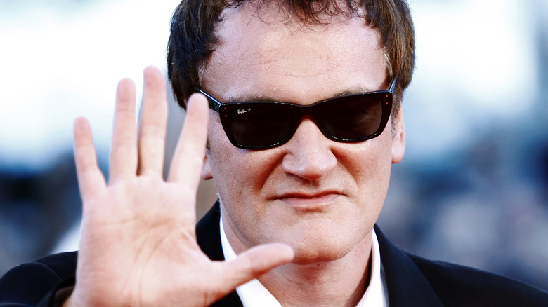 Quentin Tarantino waving