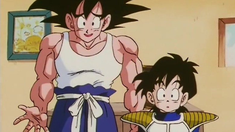 Goku shrugs while Gohan looks on