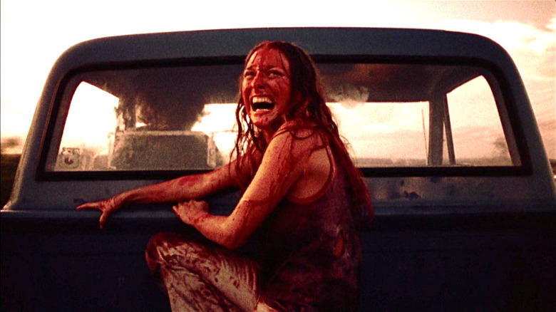 A bloodied Marilyn Burns laughing