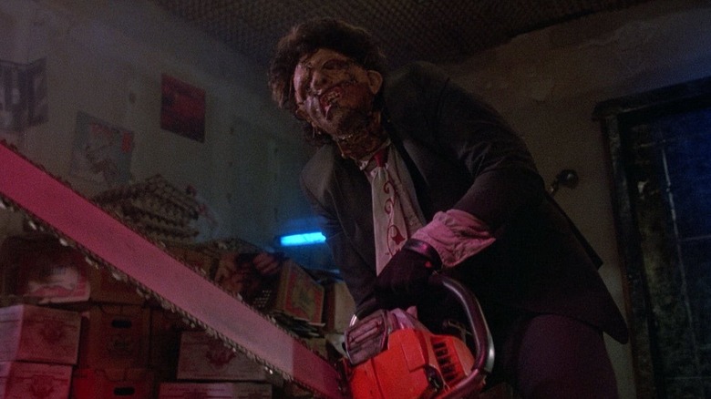 Leatherface holding his chainsaw