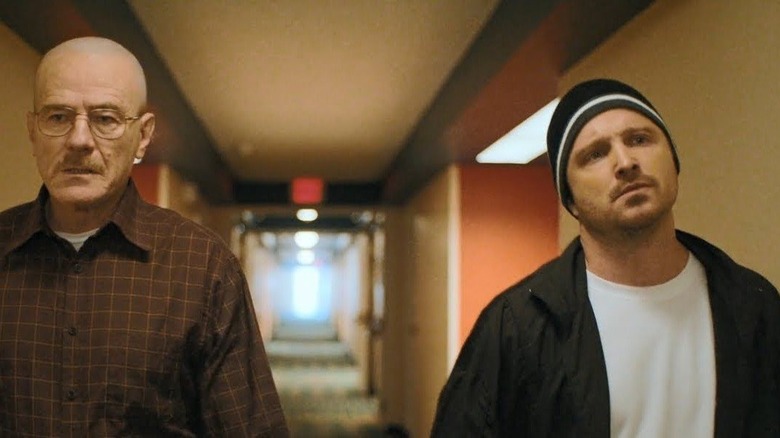 jesse and walt walking in hallway