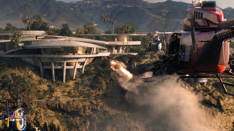 The Mandarin's helicopters fire missiles at Tony Stark's house