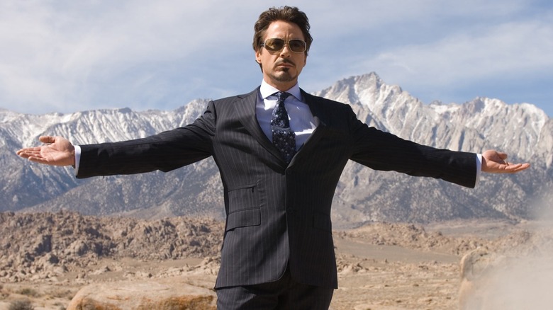 Tony Stark in suit demonstrating a missile in Afghanistan