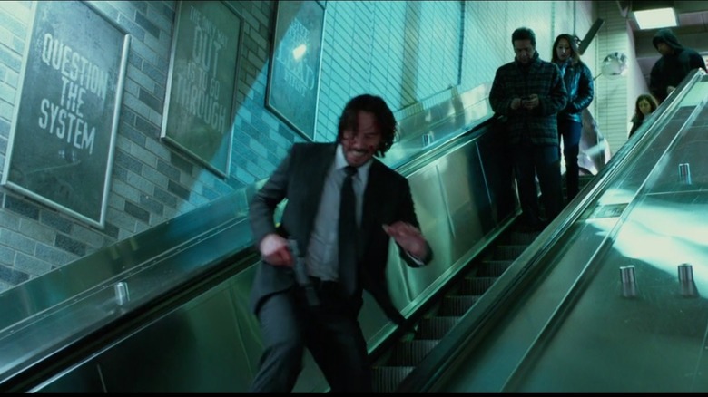 John escaping into the subway