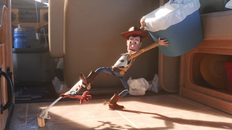 Woody keeps Forky out of the trash in Toy Story 4