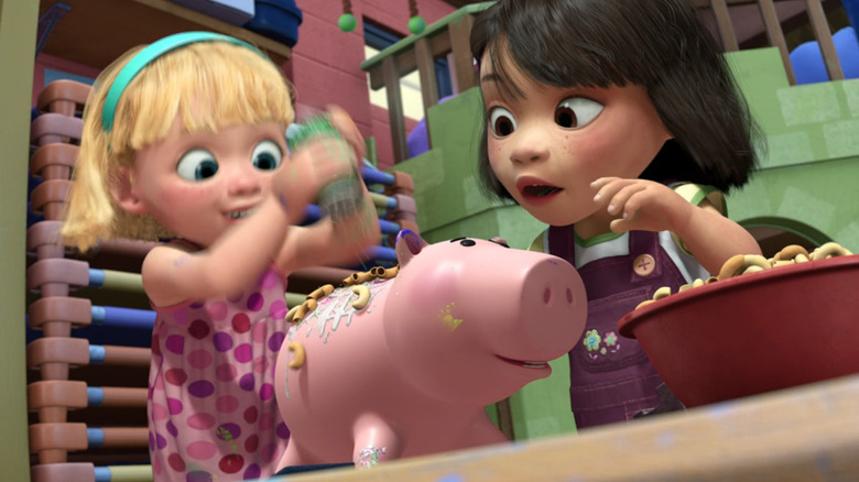 Toddlers abusing Hamm in Toy Story 3