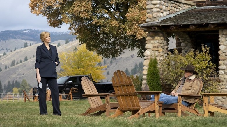 John and Beth sit on the lawn