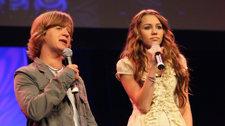 Jason Earles and Miley Cyrus on stage