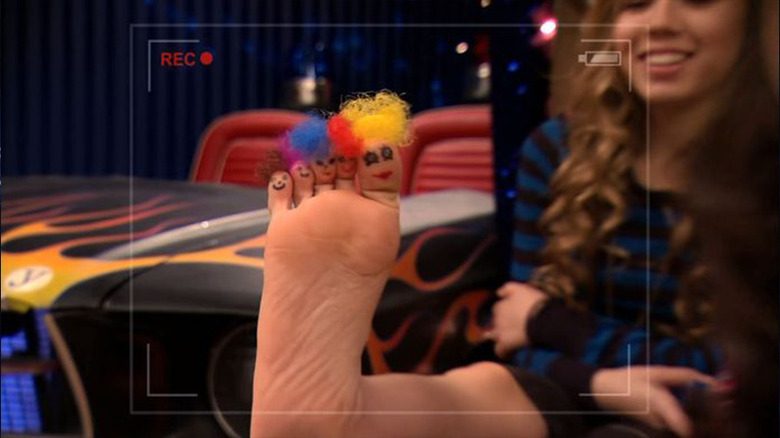 Toes with wigs and faces