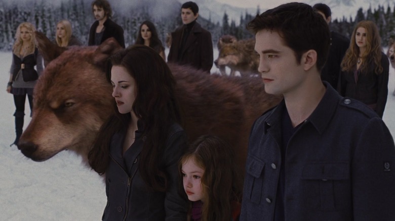 Wolf Jacob, Bella, Renesmee, Edward stand