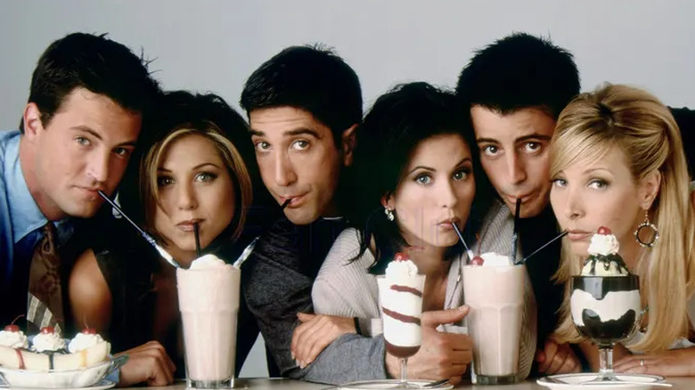 Friends cast drinking milkshakes