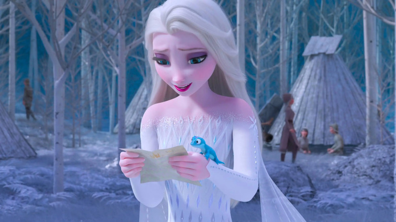 Elsa reading Anna's letter