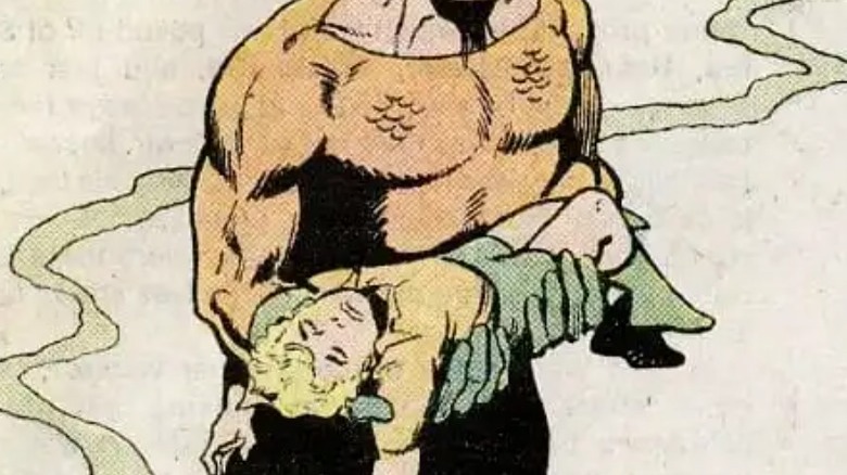 Aquaman holding dead Aquababy