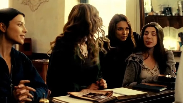 Group of women at check in desk