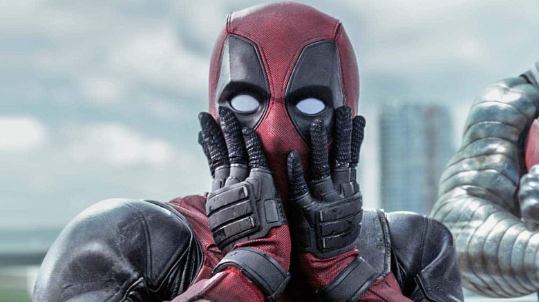 Deadpool puts his hands on his face