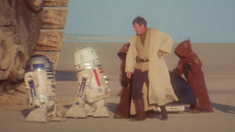 Owen Lars inspecting droids