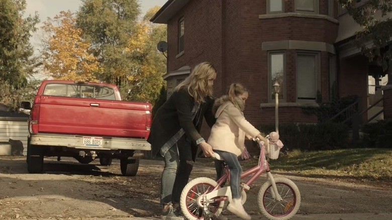 Clare's mom helps daughter bike