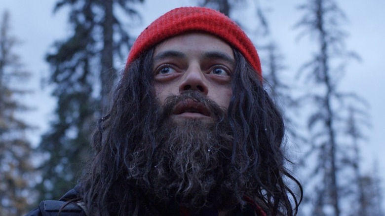 Rami Malek as bearded Buster