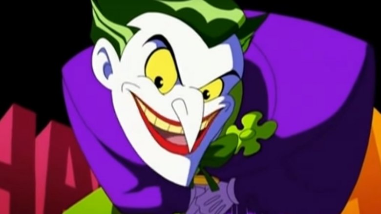 the joker leans forward