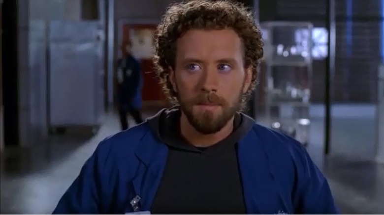 Hodgins standing in lab 