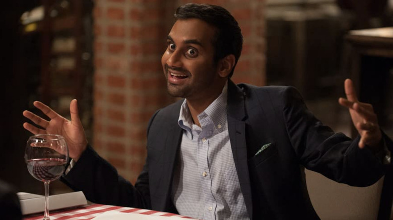 Aziz Ansari arms out