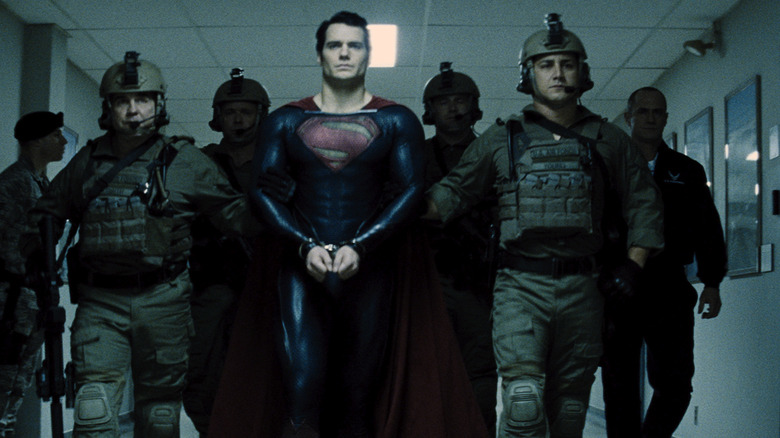 Superman escorted by military