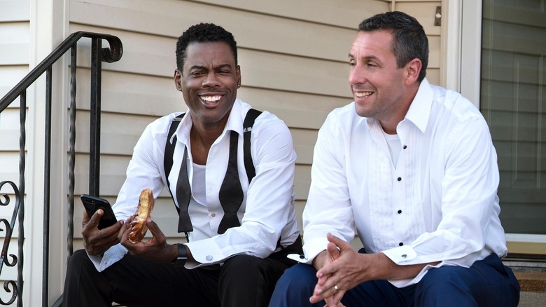 Adam Sandler laughs with Chris Rock