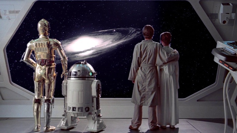 Luke Leia Threepio and R2D2 looking out window