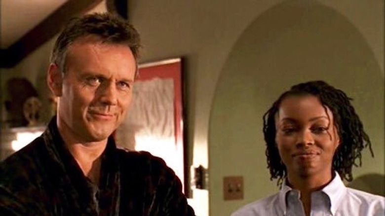 Giles and Olivia smirk