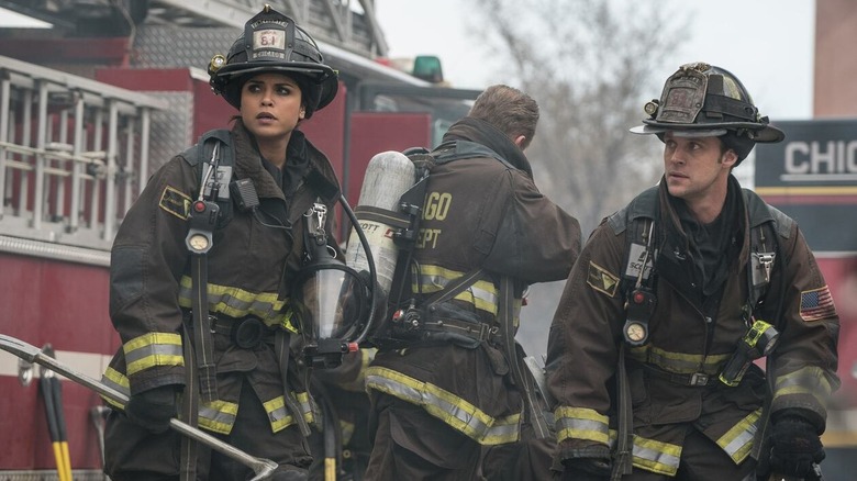 Casey and Dawson in firefighter gear