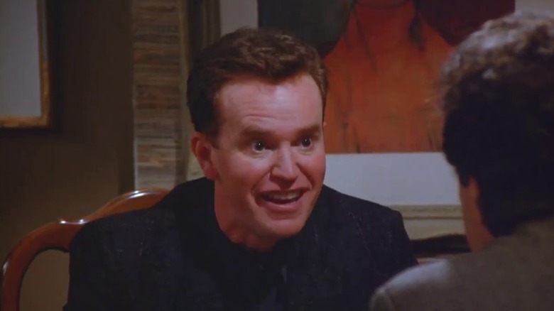 Bania smiling at Jerry