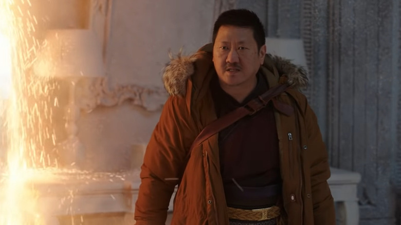 Benedict Wong in a winter coat