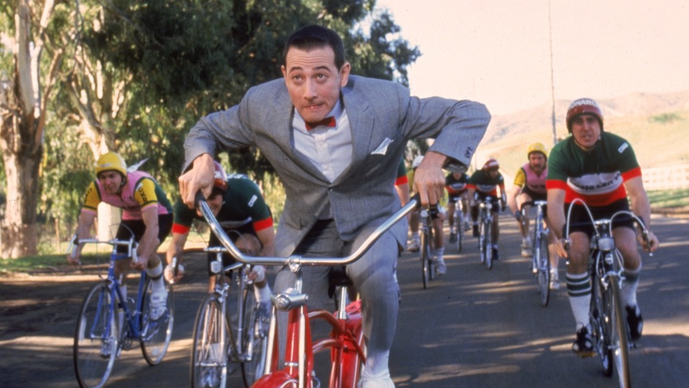 Pee-wee Herman riding a bike