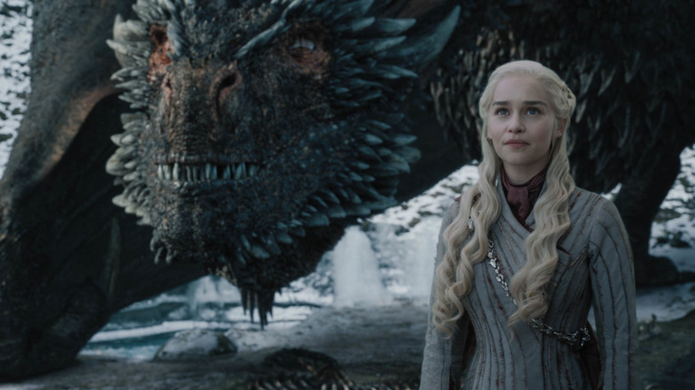 Daenerys standing with Drogon in Winterfell in Game of Thrones (2019)