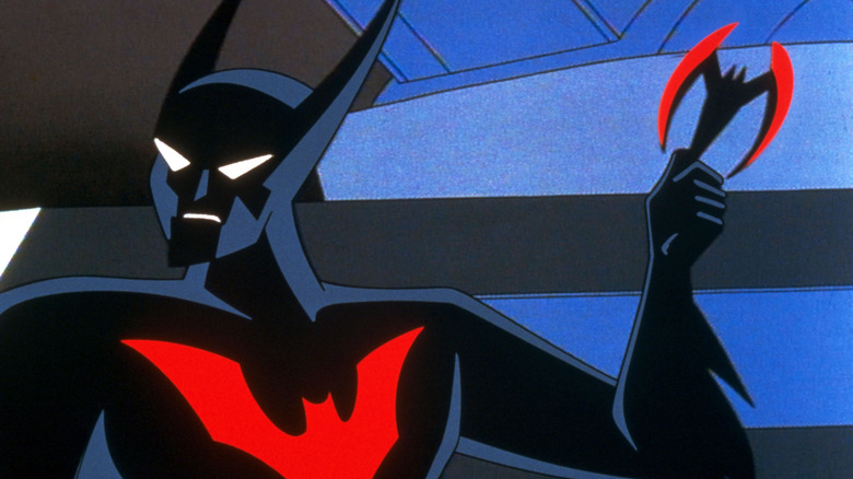 Batman Beyond holding batarang 