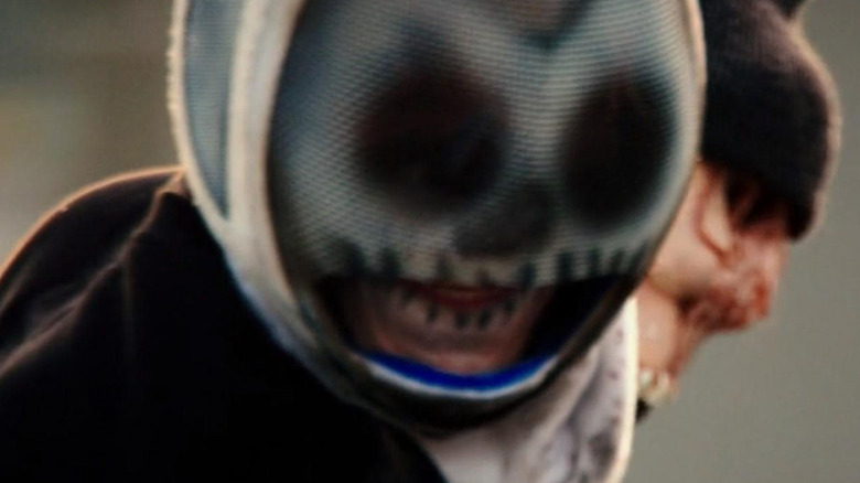 Purge Motorcyclist wearing skull helmet