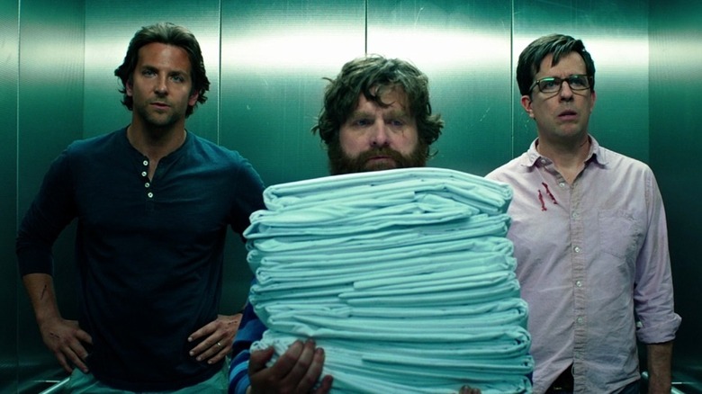 Bradley Cooper, Zach Galifianakis and Ed Helms in elevator