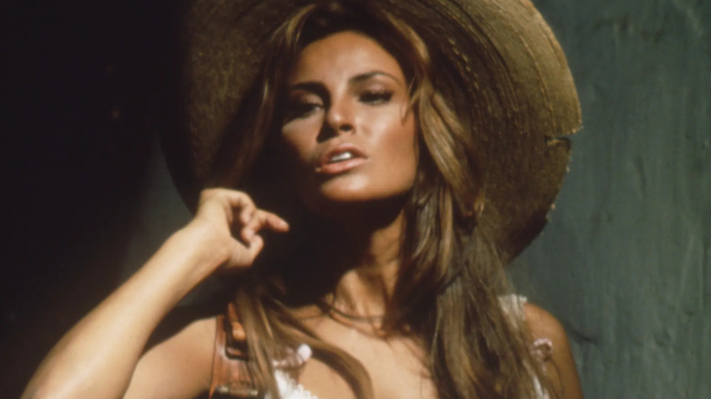 Raquel Welch in straw hat as Sarita