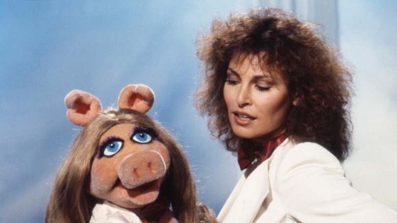 Raquel Welch posing with Miss Piggy in 1978