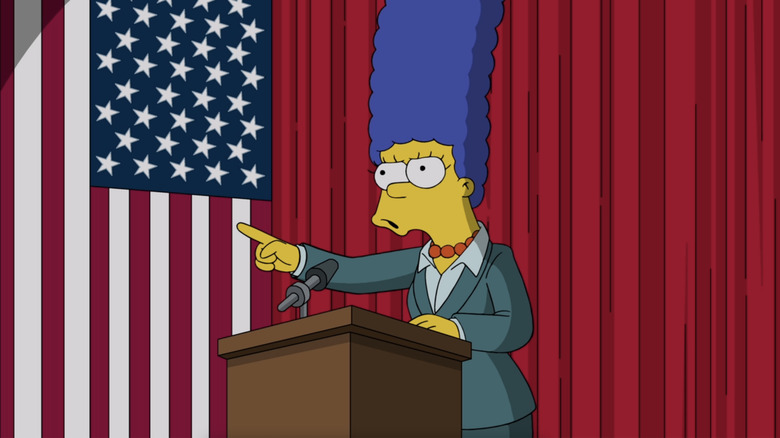 Marge Simpson standing at a podium
