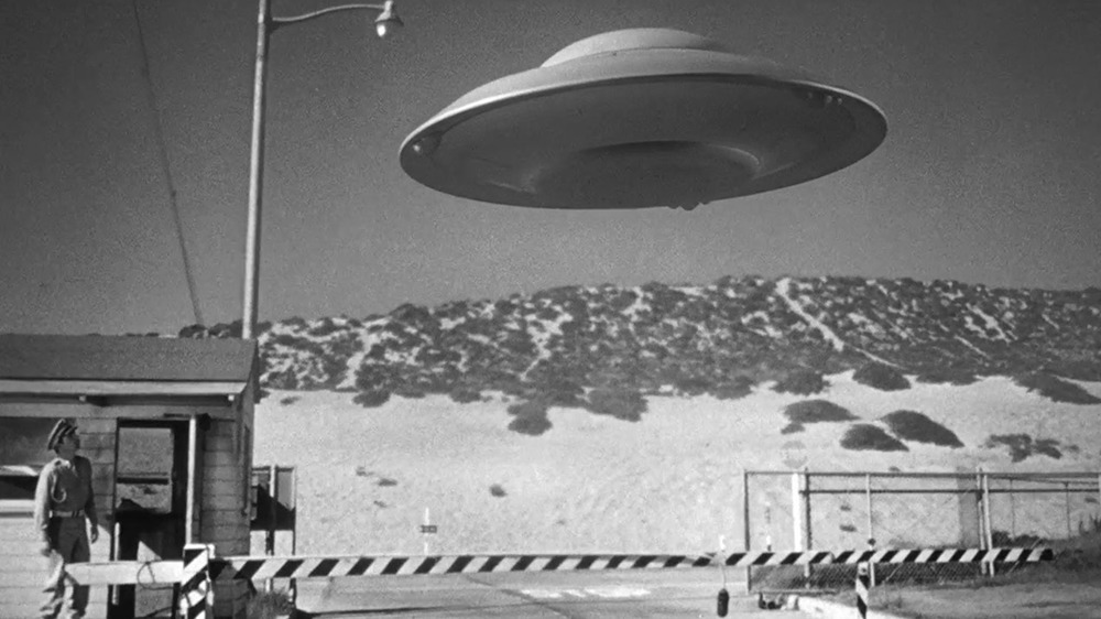 Flying saucer in sky