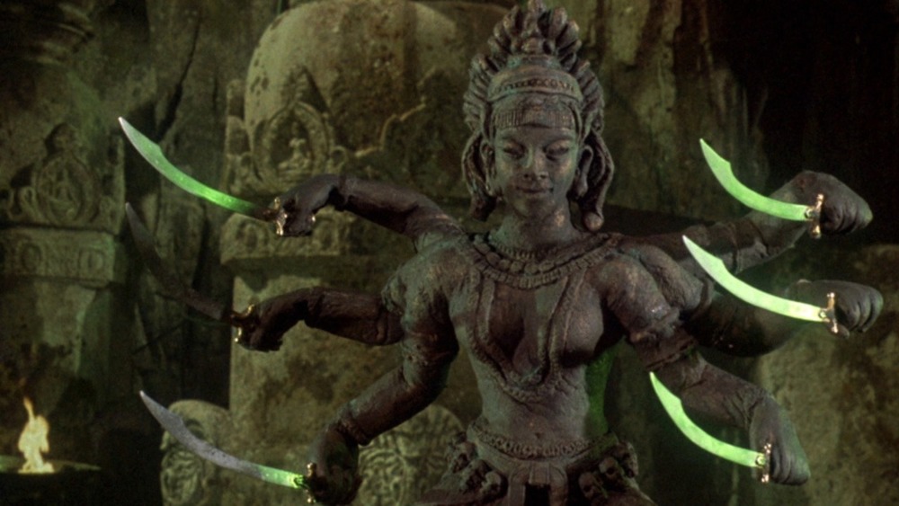 Kali holding swords