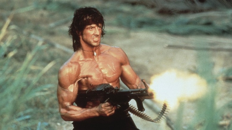 Sylvester Stallone shooting machine gun