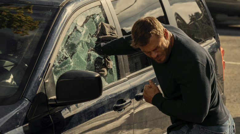 Jack Reacher smashing car window