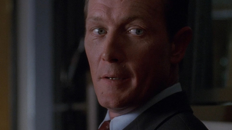 Agent Doggett looking over shoulder