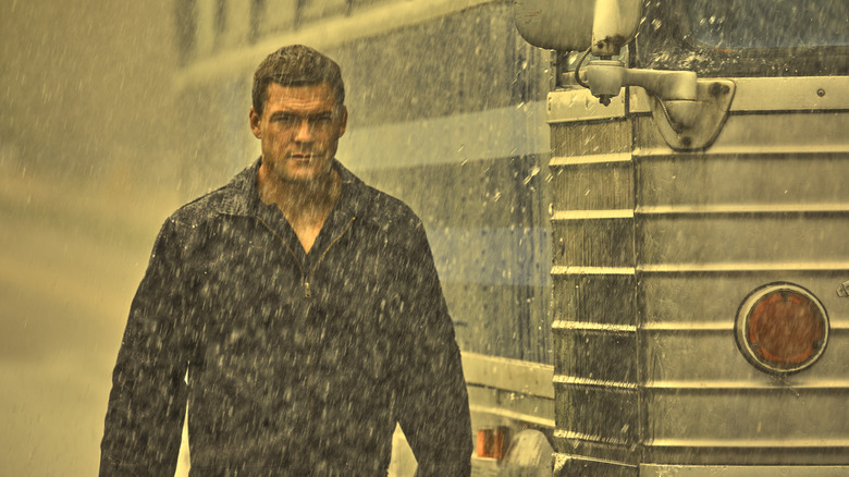 Jack Reacher walking in rain